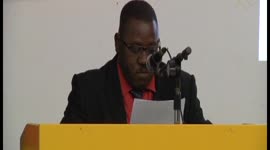 Minister TCT houdt toespraak